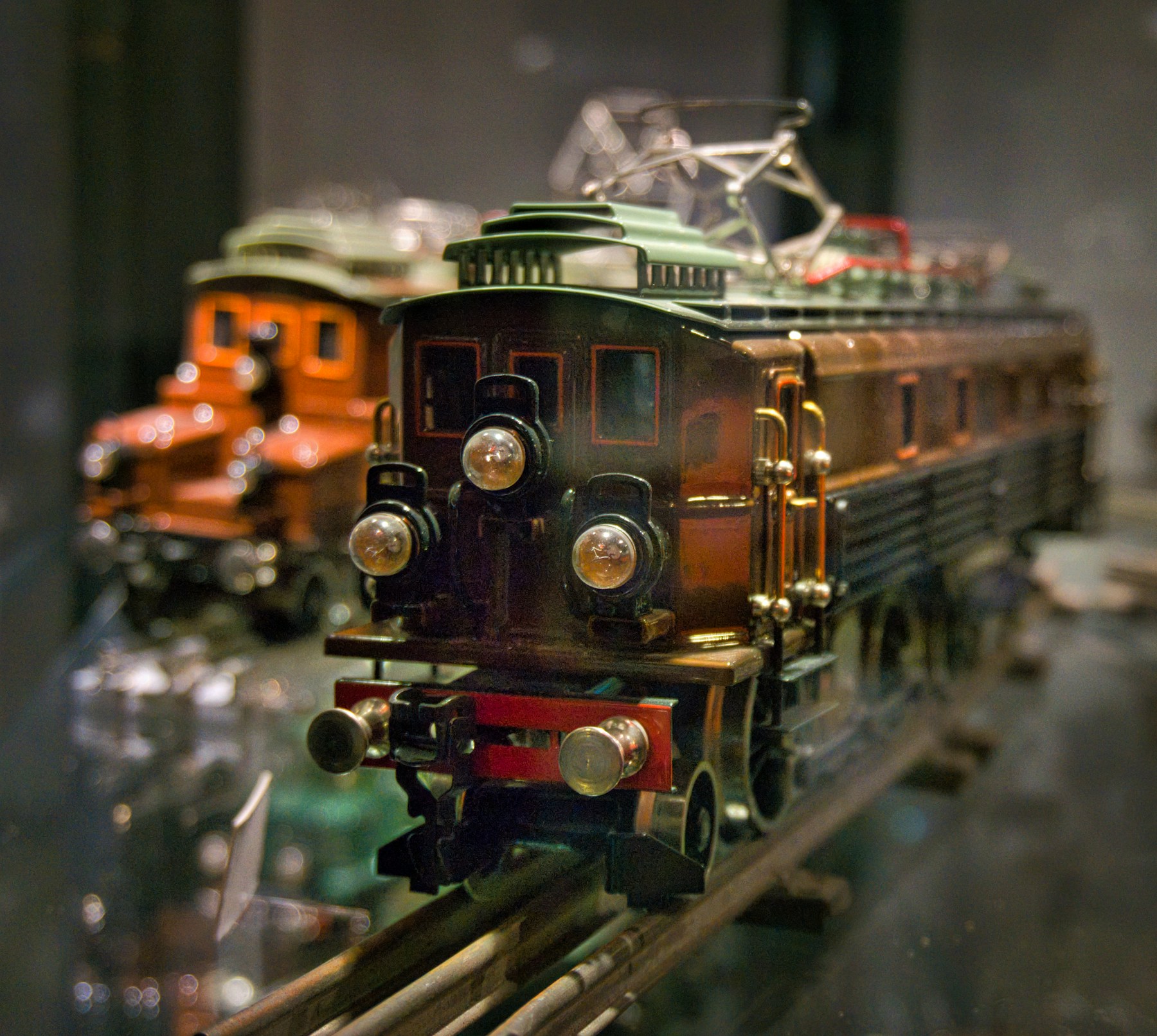 Two vintage model trains on display.